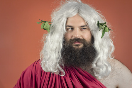Disapproving zeus god or jupiter against orange background
