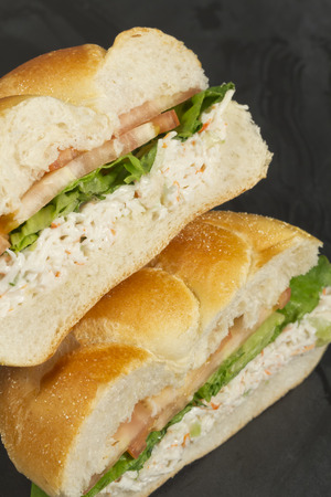 Bound seafood salad sandwich with mayo on a kaiser rollの写真素材