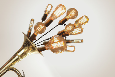 Decorative antique edison style filament light bulbs erupting from trumpetの写真素材