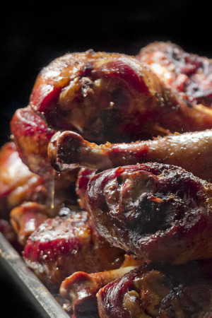 Crispy and juicy barbecue turkey legs on catering platterの写真素材