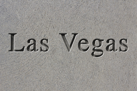 Engraving spelling the city Las Vegas on textured old surfaceの写真素材