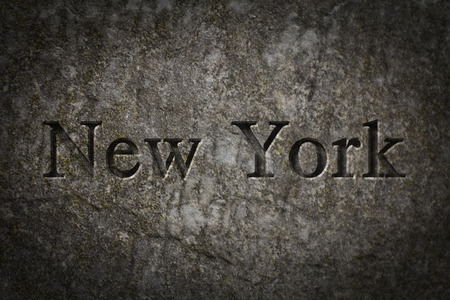 Engraving spelling the city New York on textured old surfaceの写真素材
