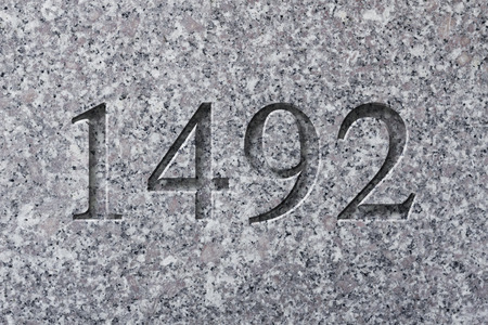 Historical year engraving 1492 on textured old surfaceの写真素材