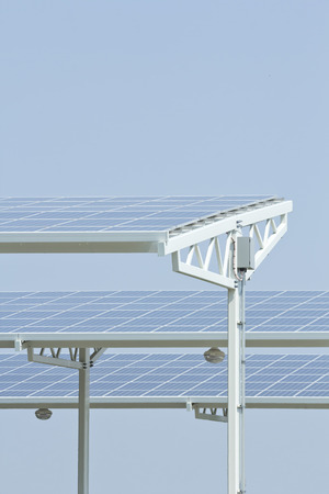 Solar panels absorbing the suns energy on hot summer day