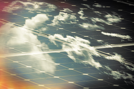 Solar panels absorbing the suns energy on hot summer dayの写真素材