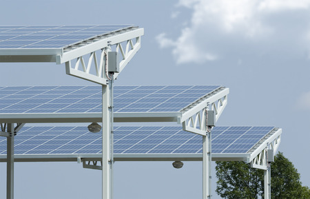 Solar panels absorbing the suns energy on hot summer day