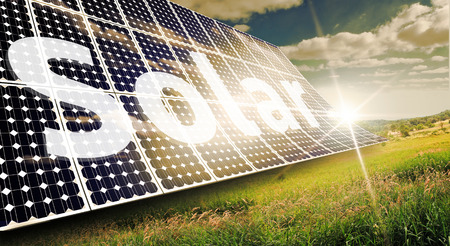 Solar panels absorbing the suns energy on hot summer dayの写真素材