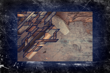 Small single handed worn sledge hammer on grunge wood backgroundの写真素材