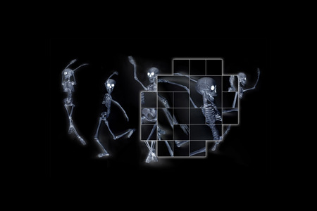 Silly dancing medical skeleton on grunge vintage backgroundの写真素材