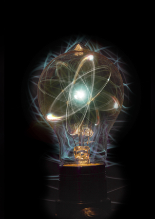 Atomic particle as lightbulb filament for nuclear energy imageryの写真素材