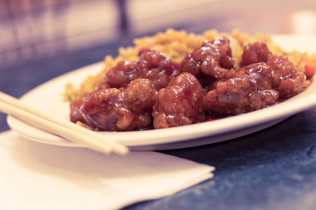 Hot and spicy chinese General Tso's chicken with fried rice