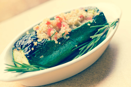 Grilled quinoa salad stuffed zucchini with rosemaryの写真素材