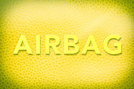 The word airbag written on car interior leather for safety imageの写真素材