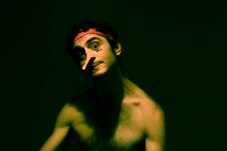 Angry skinny fighter looks tough as his liar nose growsの写真素材