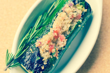 Grilled quinoa salad stuffed zucchini with rosemaryの写真素材