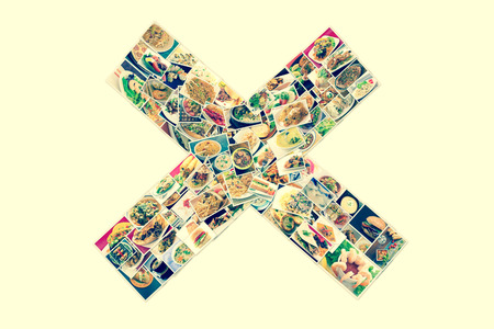Collage of lots of popular worldwide dinner foods and appetizers in X shapeの写真素材