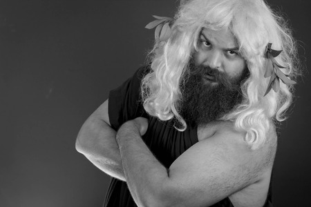 Confident zeus god or jupiter folds his arms and is ready for businessの写真素材