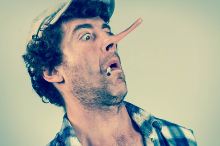 Shocked redneck jumps back in fear as his lying nose grows