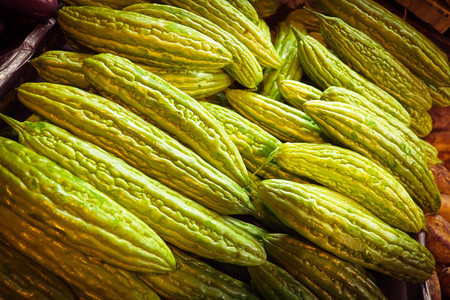 Asian bitter cucumber at a market in Chinatownの写真素材