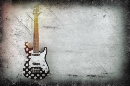 Hanging tenor electric ukulele with polka dotsの写真素材