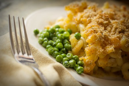 Home made baked macaroni and cheese with crispy bread crum topping