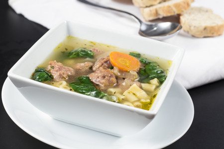 Italian wedding soup with meatballs and ditalini noodlesの写真素材