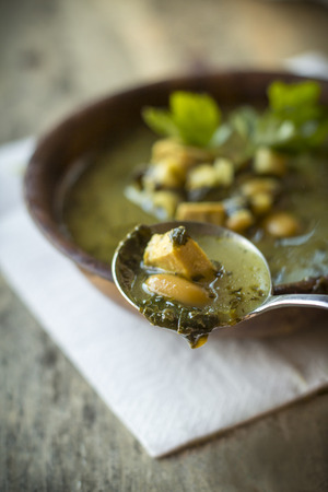Chicken pesto soup with spinach and cannellini beansの写真素材