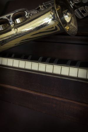 Old and worn Jazz saxophone and piano musical background