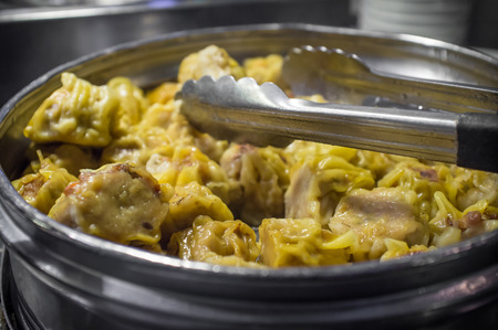 Delicious Chinese Dim Sum dumplings in large cooking potの写真素材