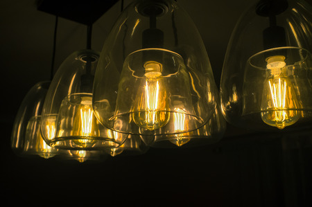 Decorative antique edison style light bulbs chandelier background