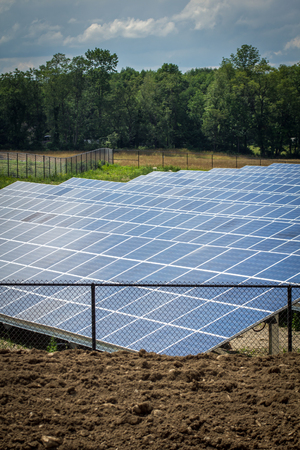 Solar panels absorbing the suns energy on hot summer day