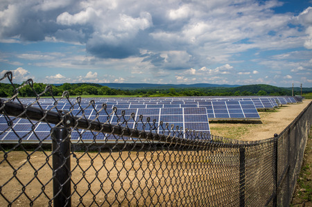 Solar panels absorbing the suns energy on hot summer day