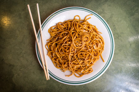 Chinese food vegetable plain lo mein noodles at restaurantの写真素材