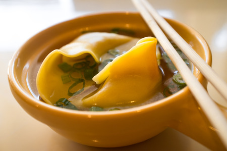 Authentic chinese food wonton soup with green onionの写真素材