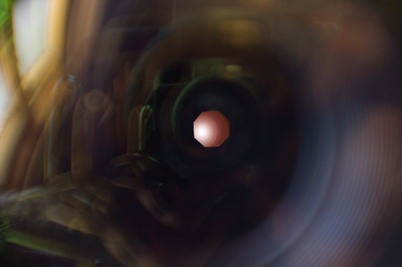 Closeup macro diaphragm of camera lens showing aperture bladesの写真素材