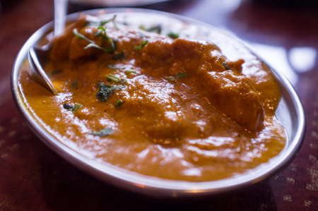 Authentic Indian cuisine Tikka Masala with moody dark lightingの写真素材