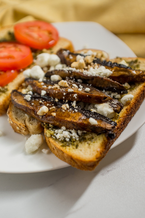 Portobello mushroom sandwich with goat cheese and pestoの写真素材