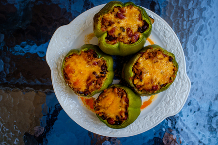 Mexican stuffed green bell pepper cooked on the grill also know as Pimiento Rellenoの写真素材