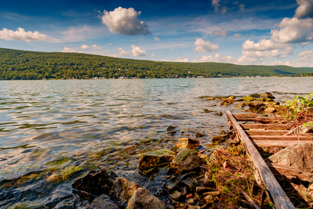 Scenic view of Greenwood lake on summer day with cloudscapeの写真素材