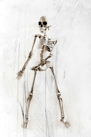 Silly dancing medical skeleton on grunge vintage background