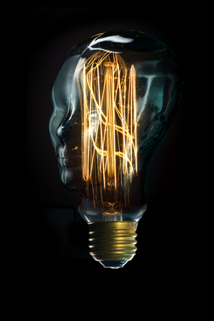 Edison lightbulb glass head for creative thoughts and ideas conceptの写真素材
