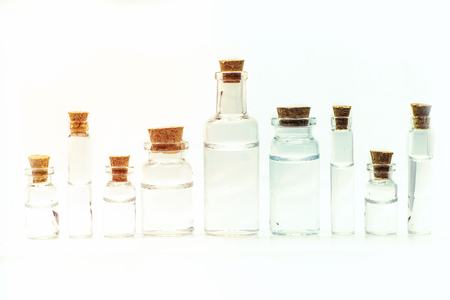 Close up glass measuring beakers for science experiment backgroundの写真素材