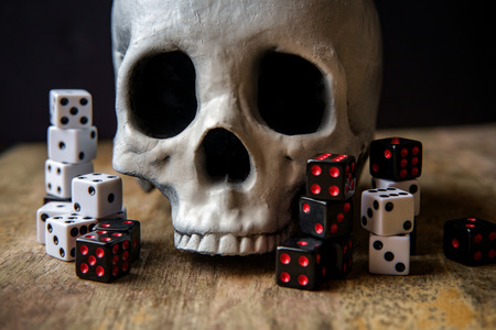 Grunge evil skull with gambling dice conceptの写真素材