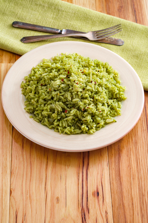 Simple yet flavorful Mexican green rice made with onions cilantro and spinachの写真素材