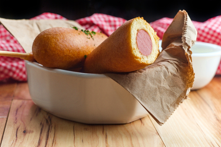 American fast-food cuisine corn dog served with steak friesの写真素材