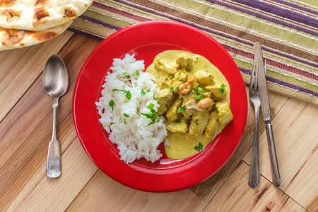 Authentic Indian chicken korma curry with jasmine riceの写真素材