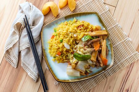 Chinese cuisine double cooked pork with mixed vegetables and fried riceの写真素材