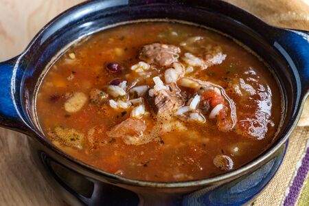 Slow cooker beef and vegetables soup with kidney beans and riceの写真素材