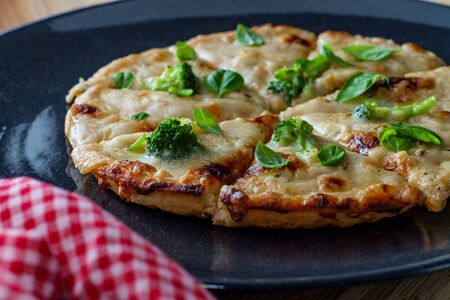 Mini personal pan white cheese pizza with broccoliの写真素材