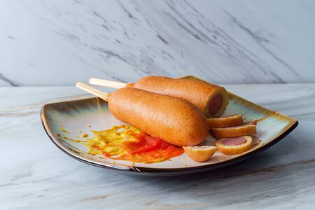 American fast-food cuisine messy corn dogの写真素材